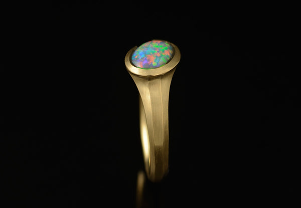 Carved yellow gold and opal ring