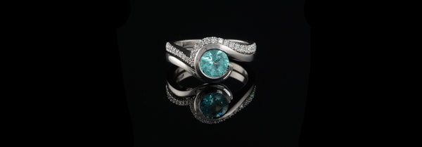 A Wave Inspired Engagement Ring with Parabia Tourmaline and Pave Diamonds