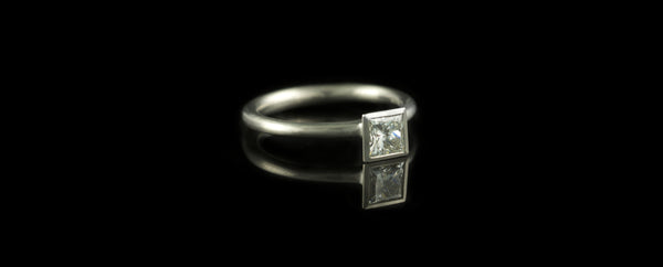 Princess cut diamond solitaire platinum engagement ring