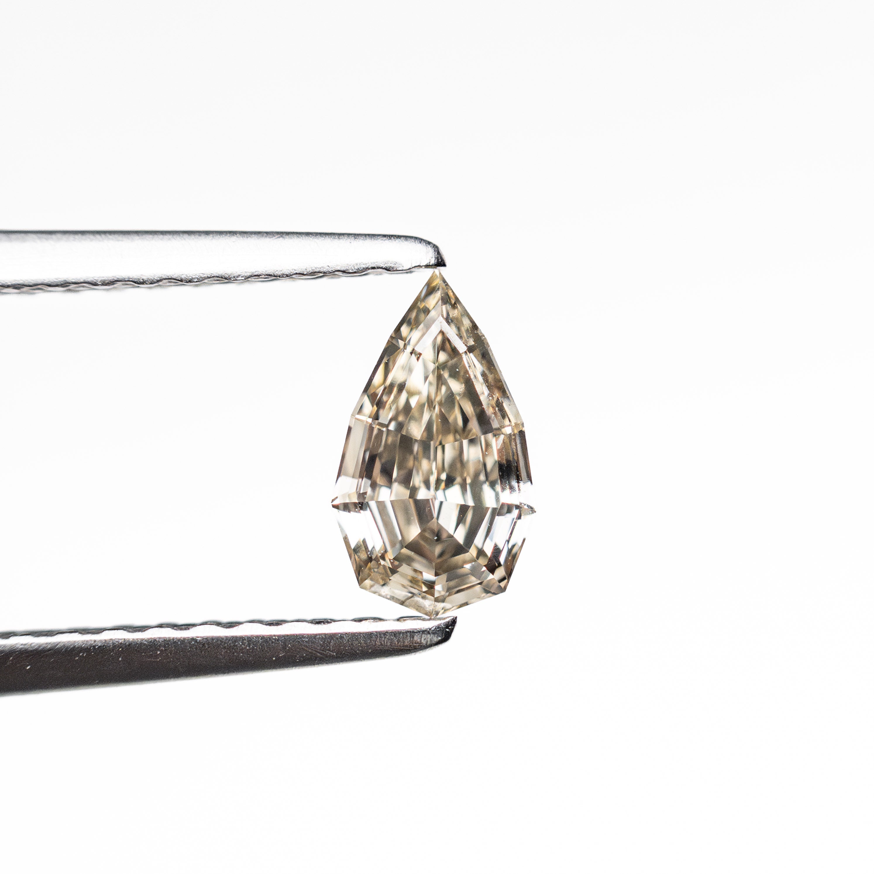 0.39ct 6.61x3.88x2.33mm VVS2 C3 Geo Pear Step Cut 🇿🇦 26109-12