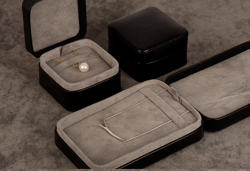 Platinum Pear-Shaped Sapphire Twist Pendant Necklace