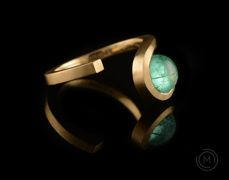 Twist cabochon paraiba tourmaline and rose gold engagement ring
