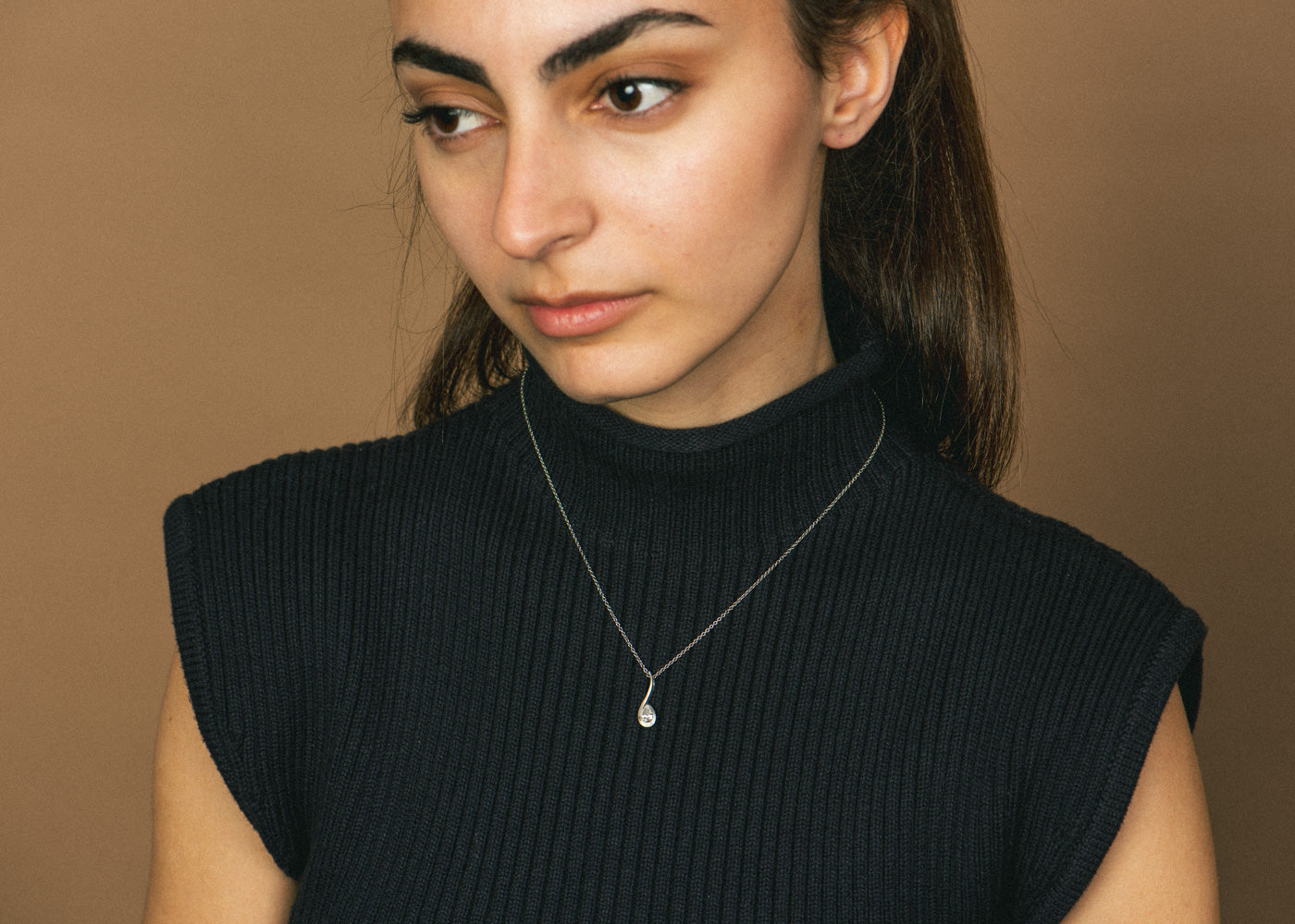 Platinum Pear-Shaped White Diamond Twist Pendant Necklace