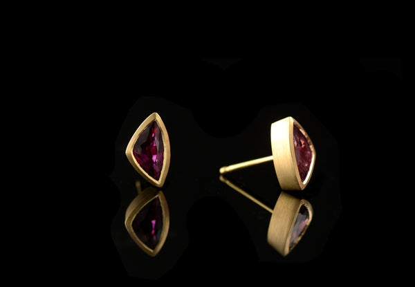 Ruby and yellow gold stud earring commission