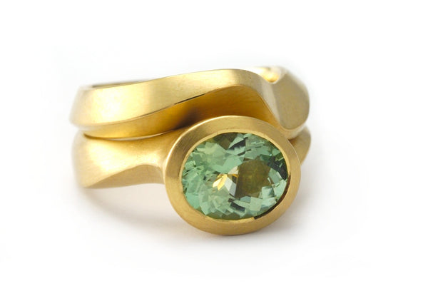 Mint green tourmaline and yellow gold wedding ring set