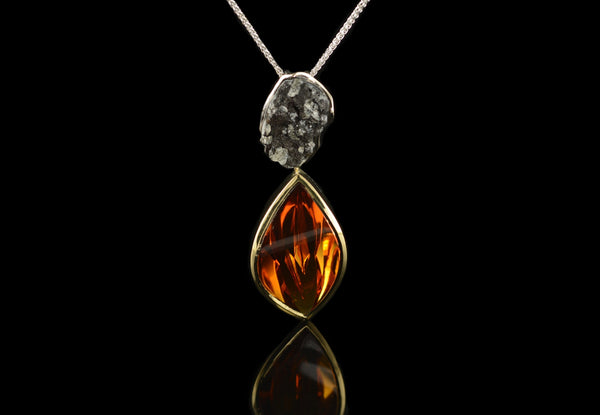 Bespoke gold pendant and earrings with volcanic lava and citrine