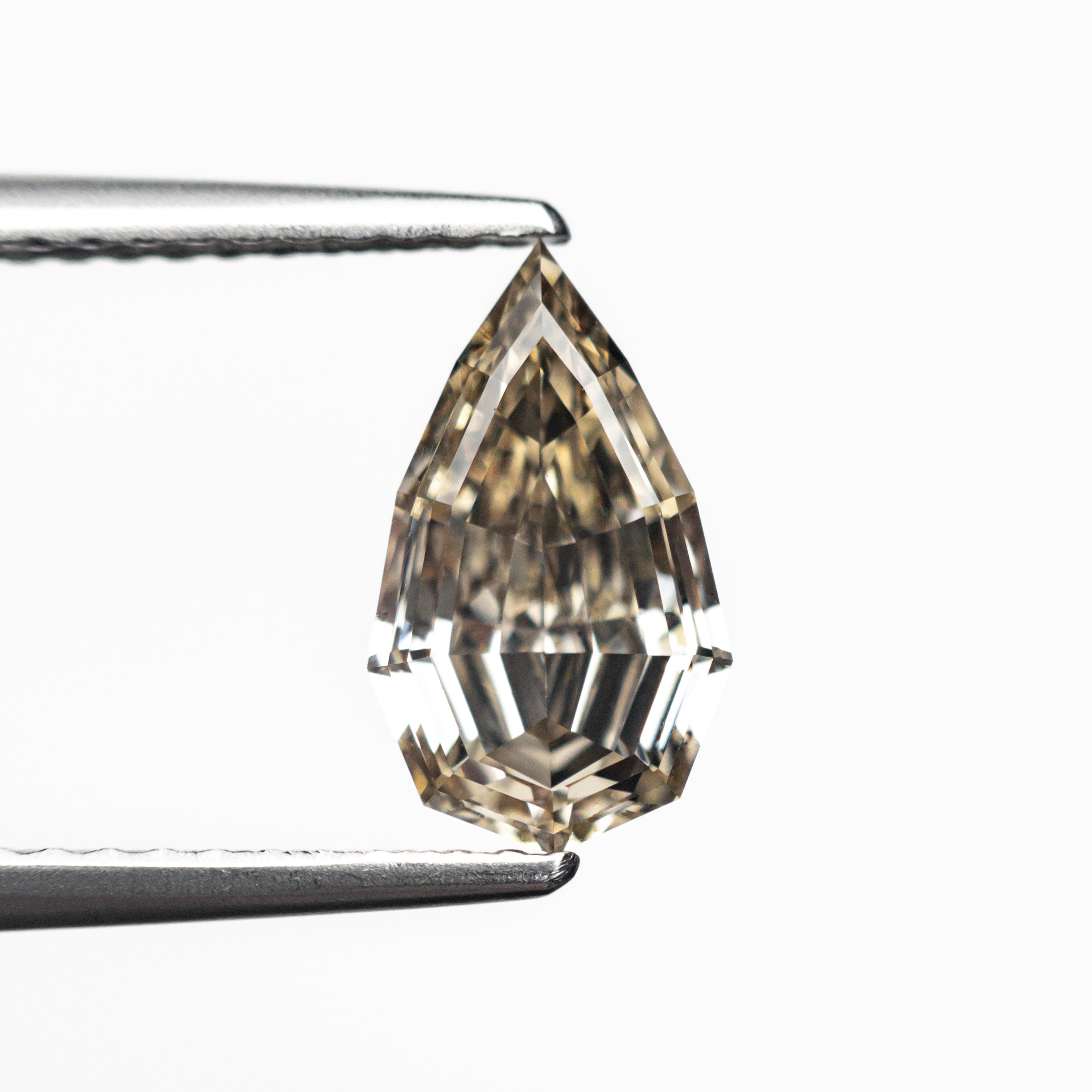 1.46ct 10.11x5.96x3.56mm VS1 C6 Geo Pear Step Cut 27082-03