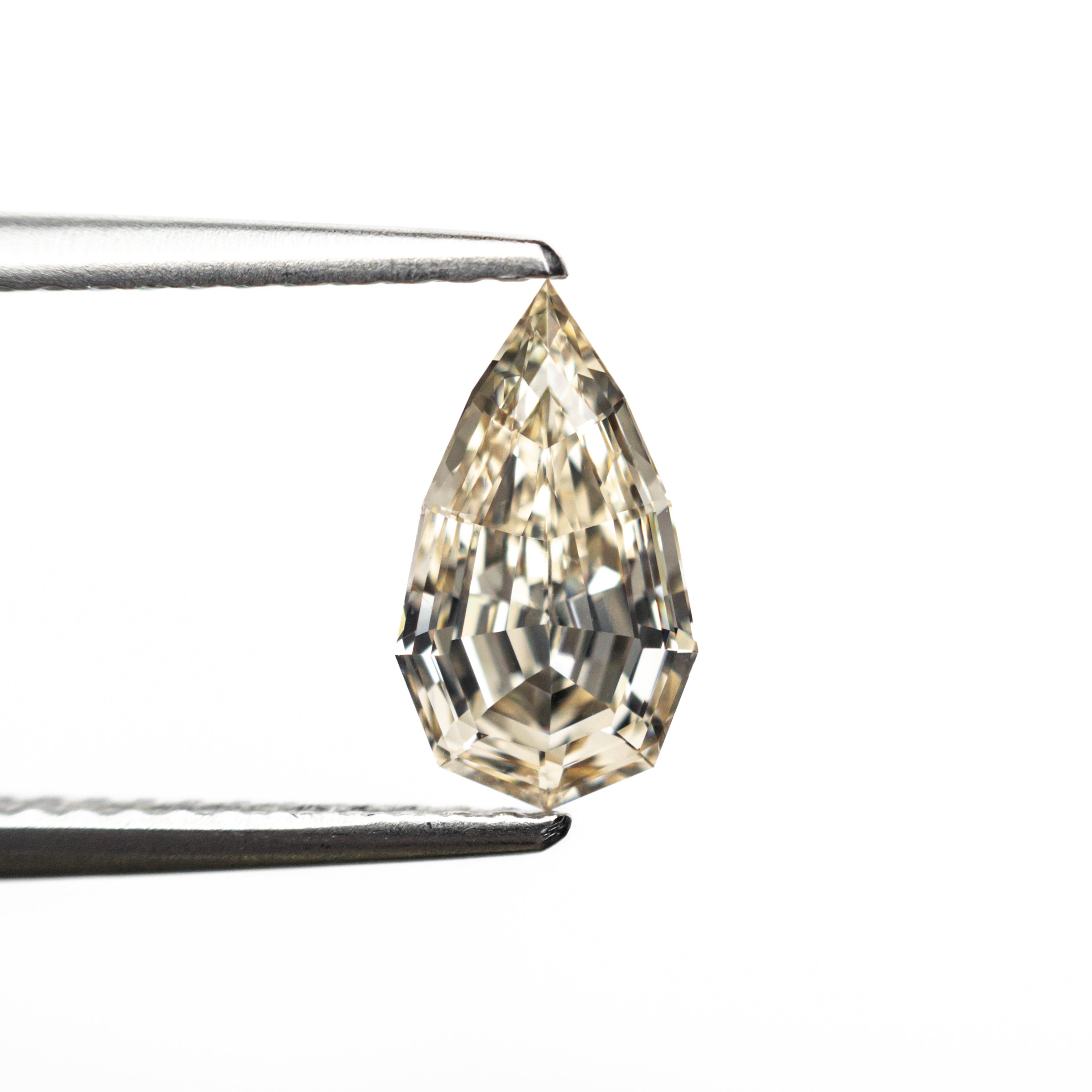 1.00ct 9.19x5.243.17mm Geo Pear Step Cut 27082-13