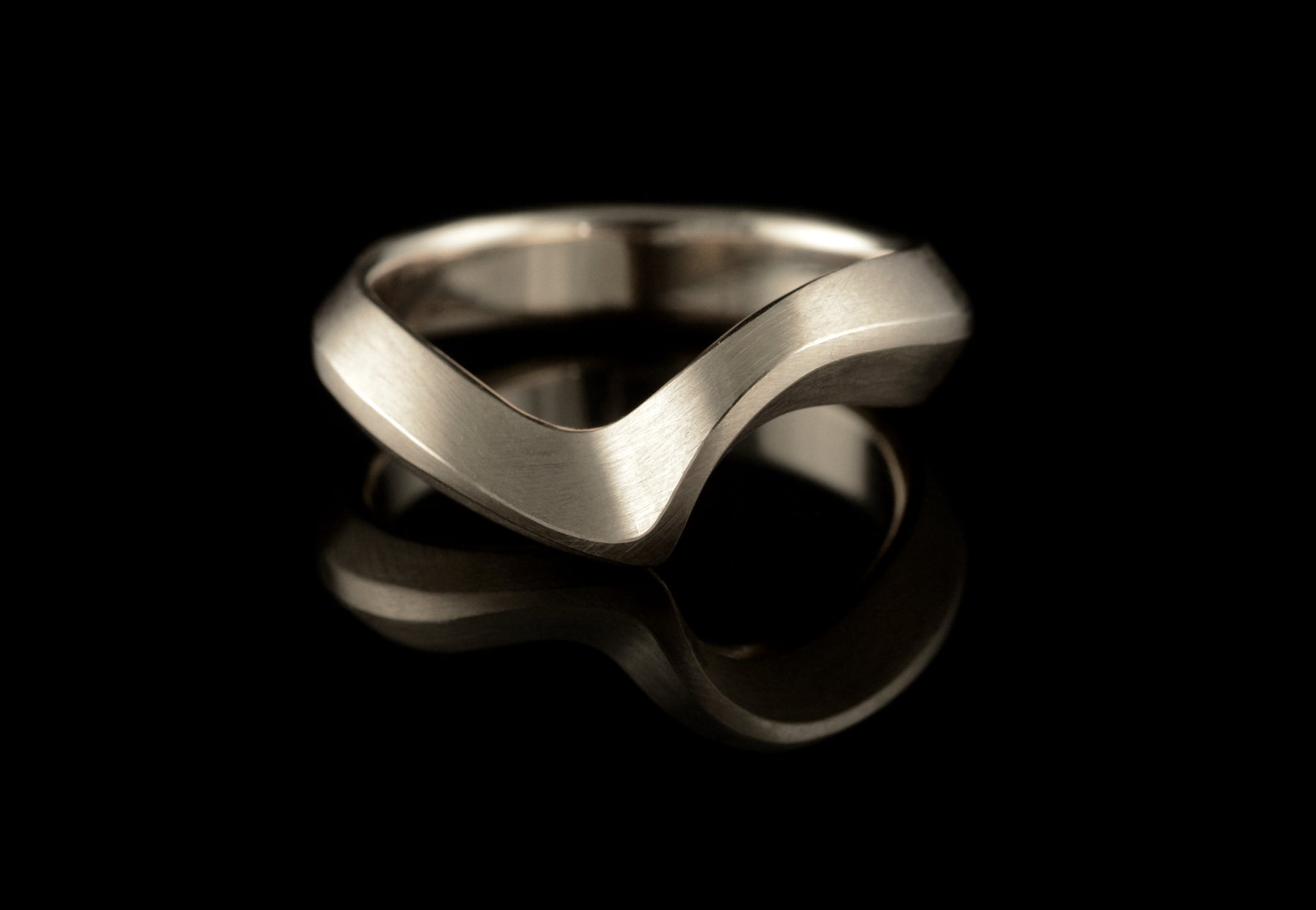 Arris carved platinum wedding ring