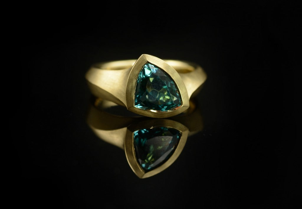 Arris trillion cut blue green tourmaline yellow gold engagement ring