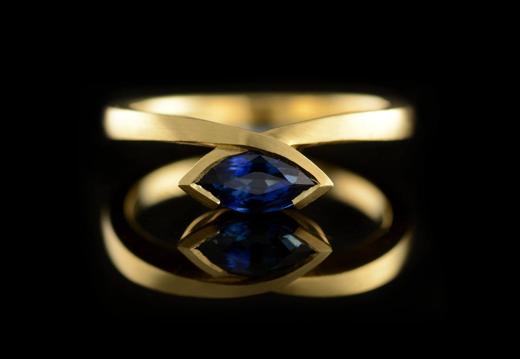 Marquise blue sapphire yellow gold engagement ring