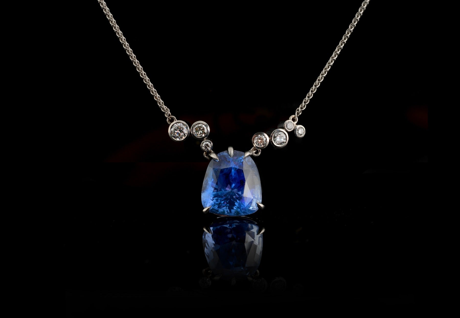 Sapphire and white diamond platinum pendant 