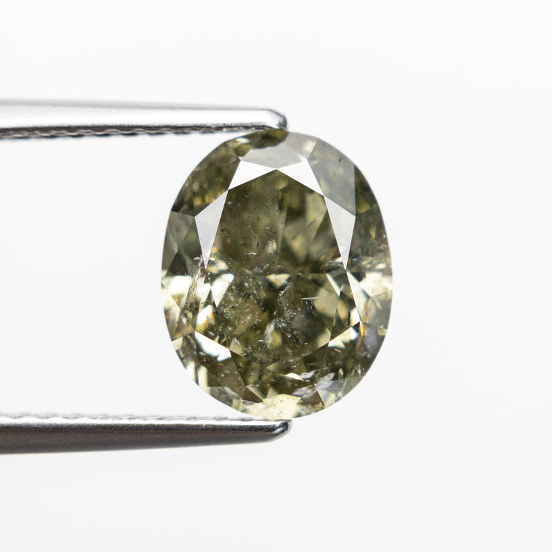 2.61ct 9.52x7.64x4.73mm I1 Fancy Greenish Yellow Chameleon Oval Brilliant 18840-01 - Misfit Diamonds