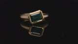 Arris carved yellow gold and Zambian emerald ring