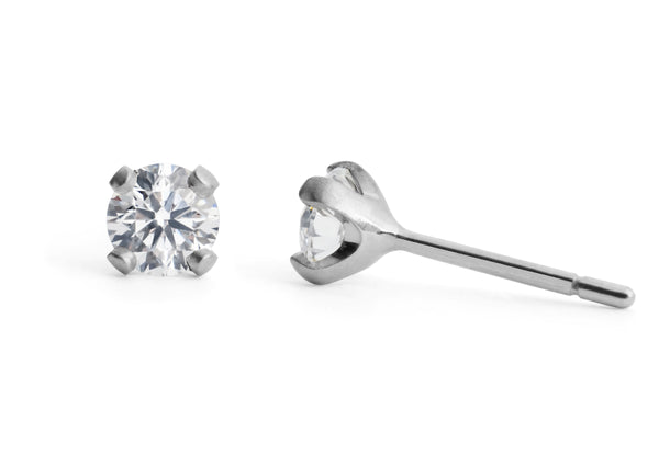 Sculpted platinum 4 claw white diamond engagement ring – McCaul