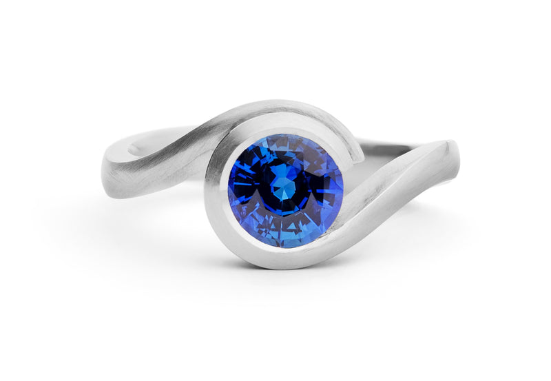 Platinum and blue sapphire Wave engagement ring McCaul