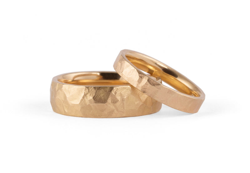 Rose gold hammered wedding rings for men and women